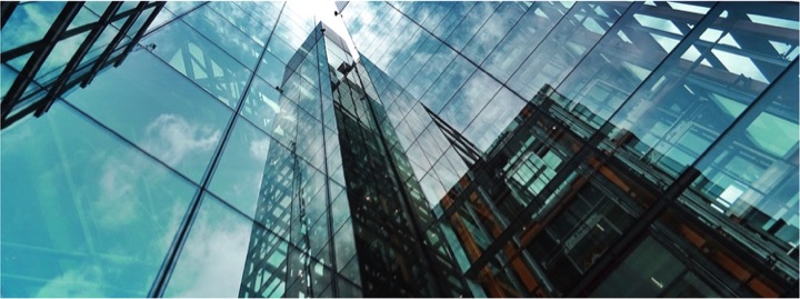 High-performance VIG glazing on a commercial building facade — U-values below 0.5 W/m²K